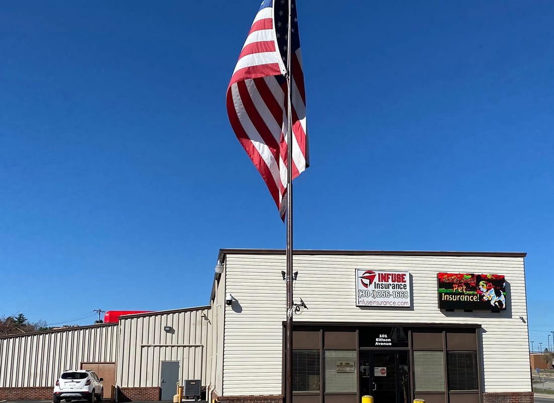 Beckley, WV - Exterior View of the Infuse Insurance Office in Beckley West Virginia Against a Bright Blue Sky