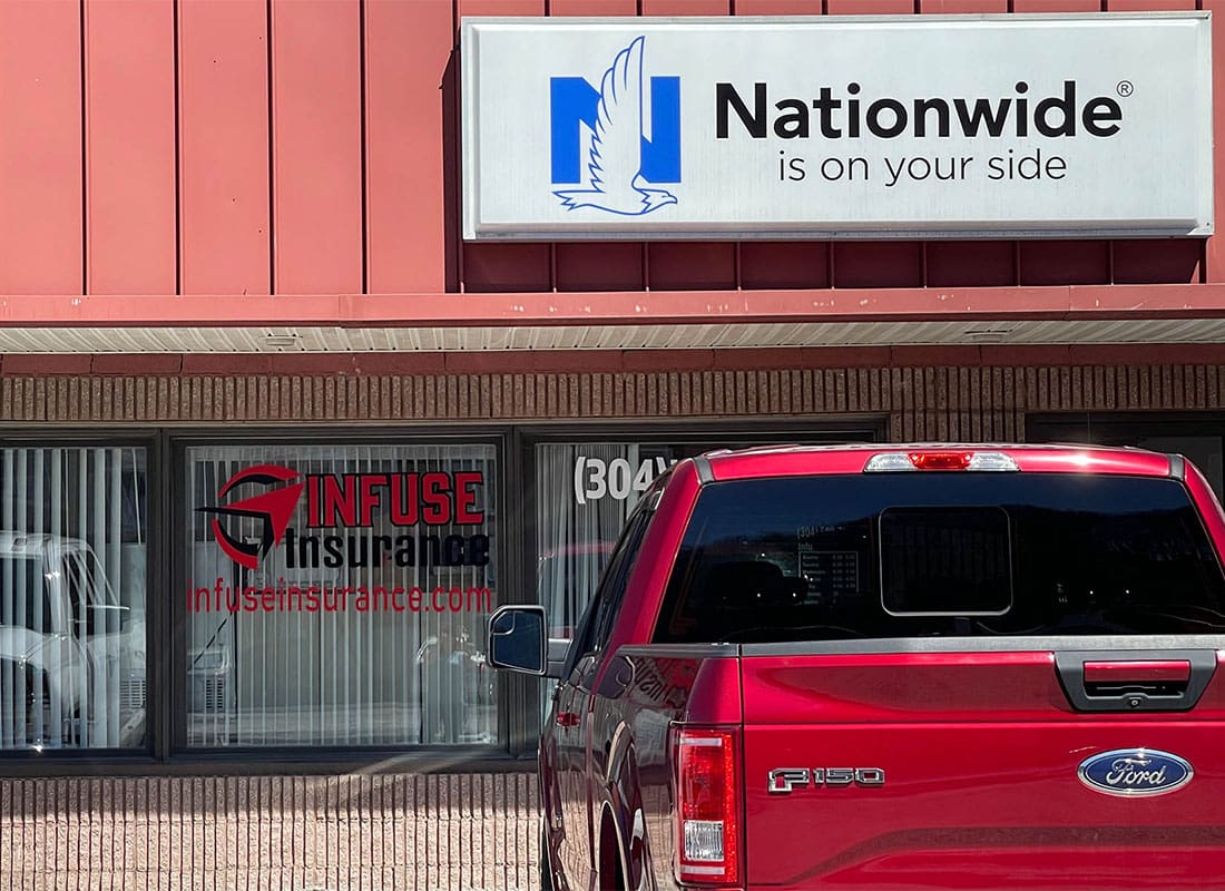 Bluewell, WV - Exterior View of the Front Entrance to the Infuse Insurance Office with a Nationwide Sign in Bluewell West Virginia on a Sunny Day