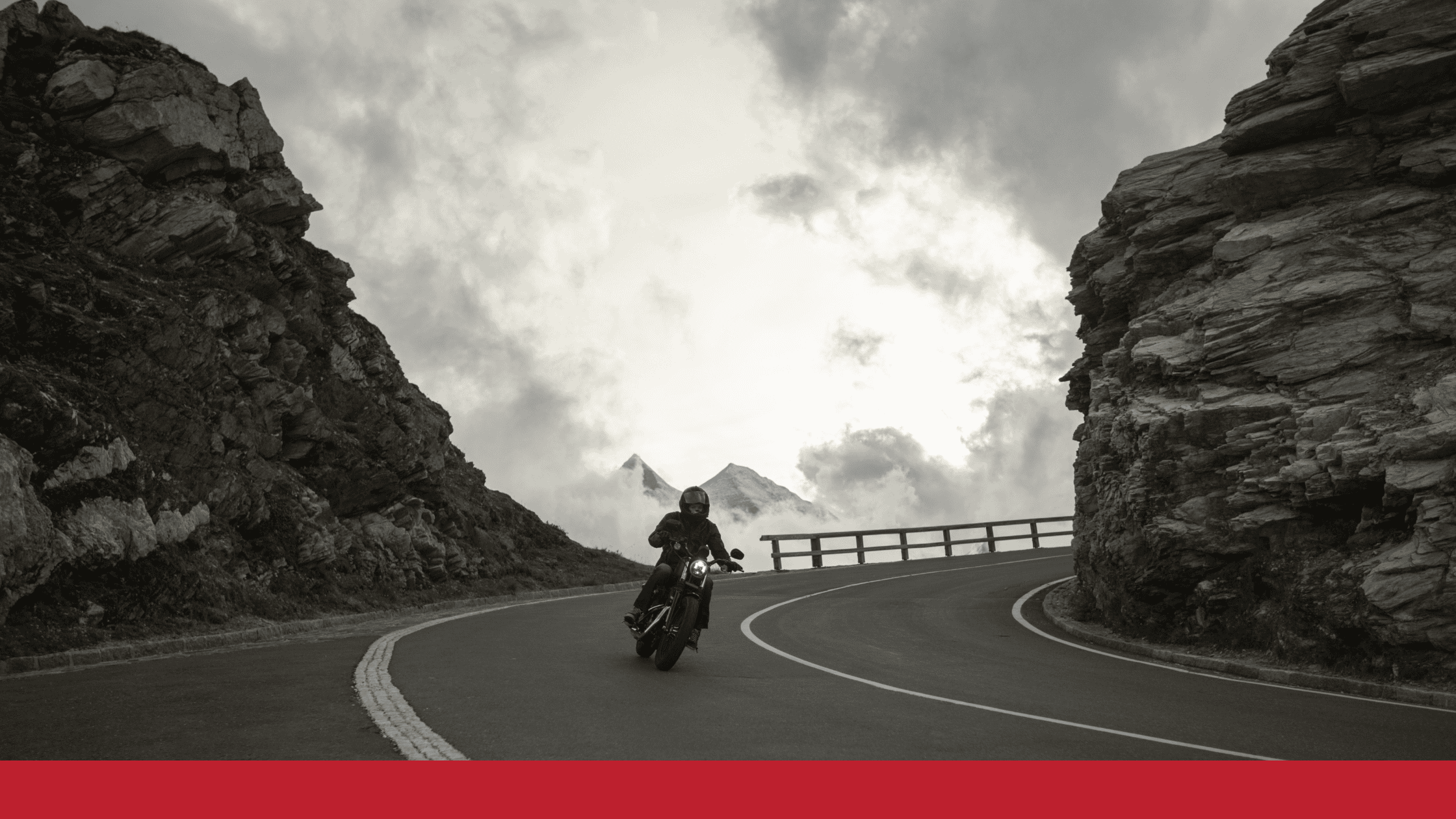 motorcycle rider on a mountain road